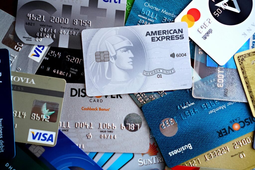 pexels-photo-32641816-32641816 Close-up image of various credit and debit cards including Visa, MasterCard, American Express, and Discover.